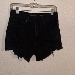 Black distressed shorts